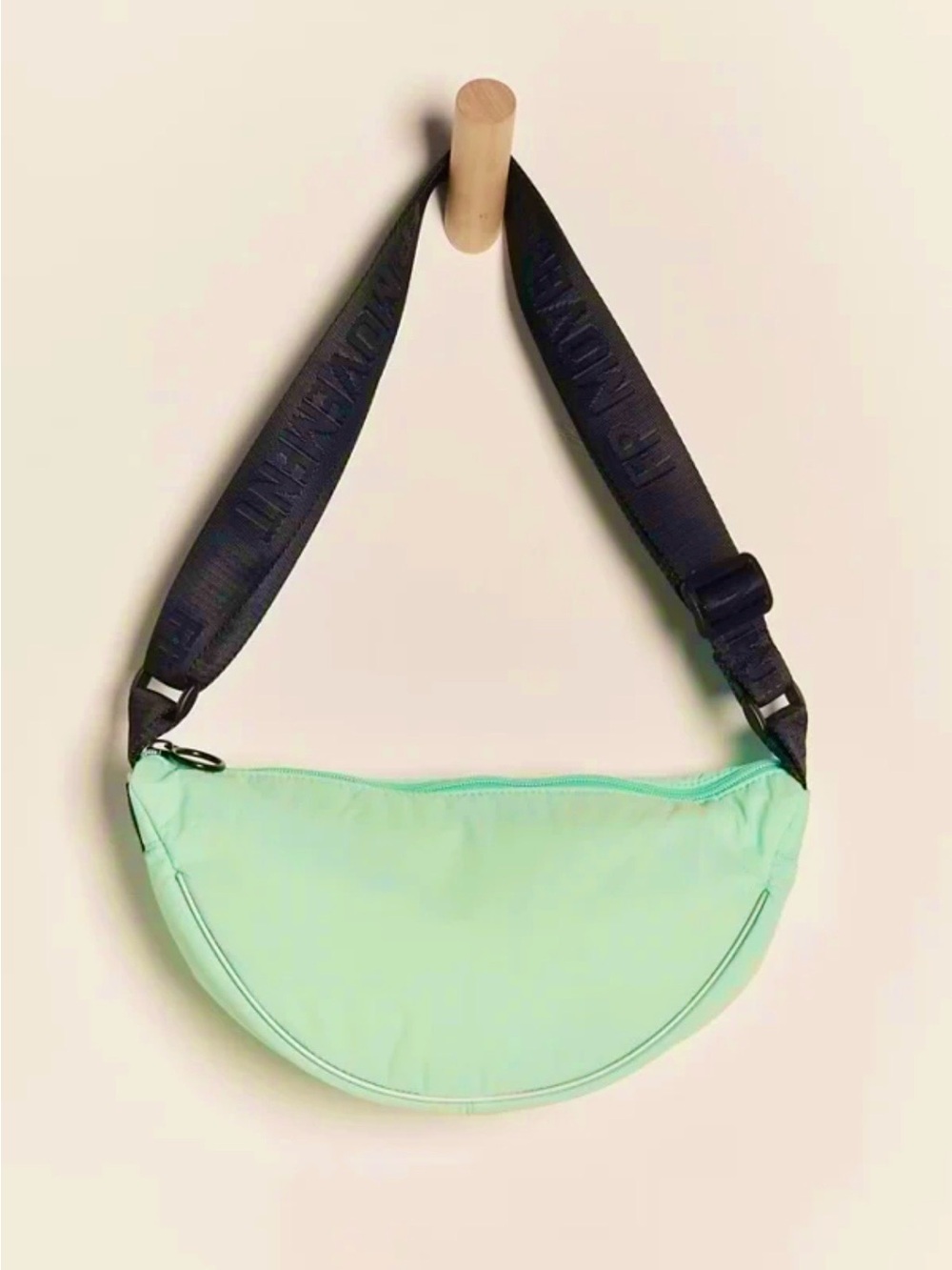 NWT FREE PEOPLE MOVEMENT BULL’S EYE CROSSBODY SLING BAG COLOR IS PISTACHIO!!